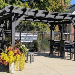 pergola with table and chairs